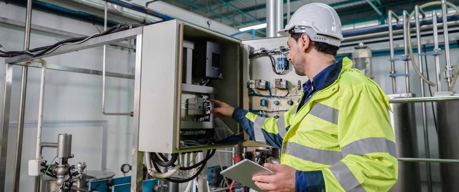 professional technician engineer working to control electrical power and safety service system